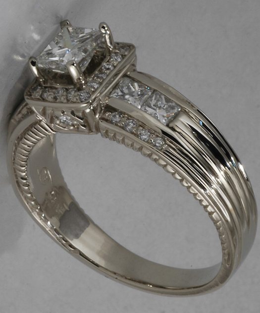 Custom 14Kt white gold and diamond princess cut diamond ring