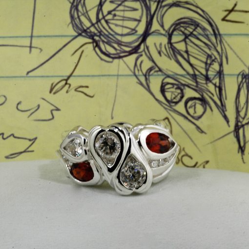 custom garnet and argentium sterling silver with diamond rings