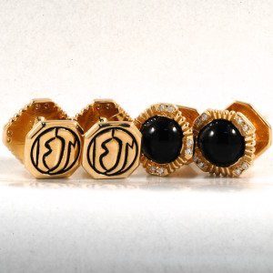 two pairs of 14kt yellow gold black initial and black onyx gents cuff links