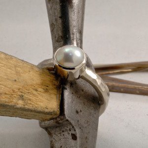 custom 14Kt white gold pearl bezel hammered style ring