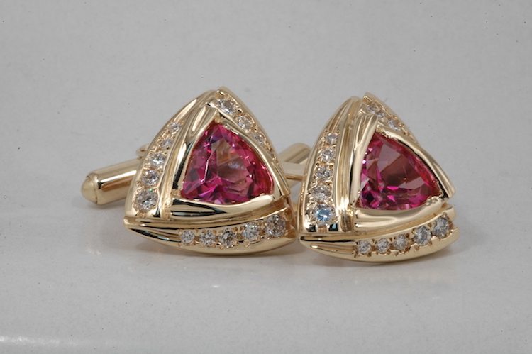 custom pair of 14 kt yellow gold diamond and trillion pink sapphire cuff links