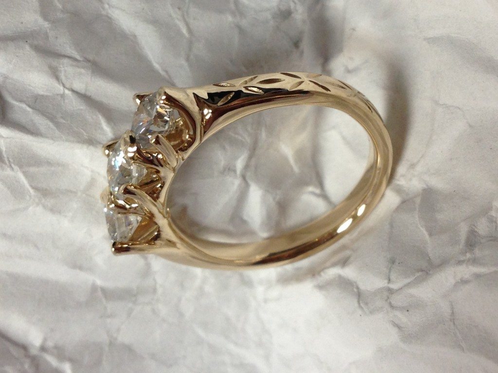 organic style 14 kt yellow gold custom 3 stone diamond ring