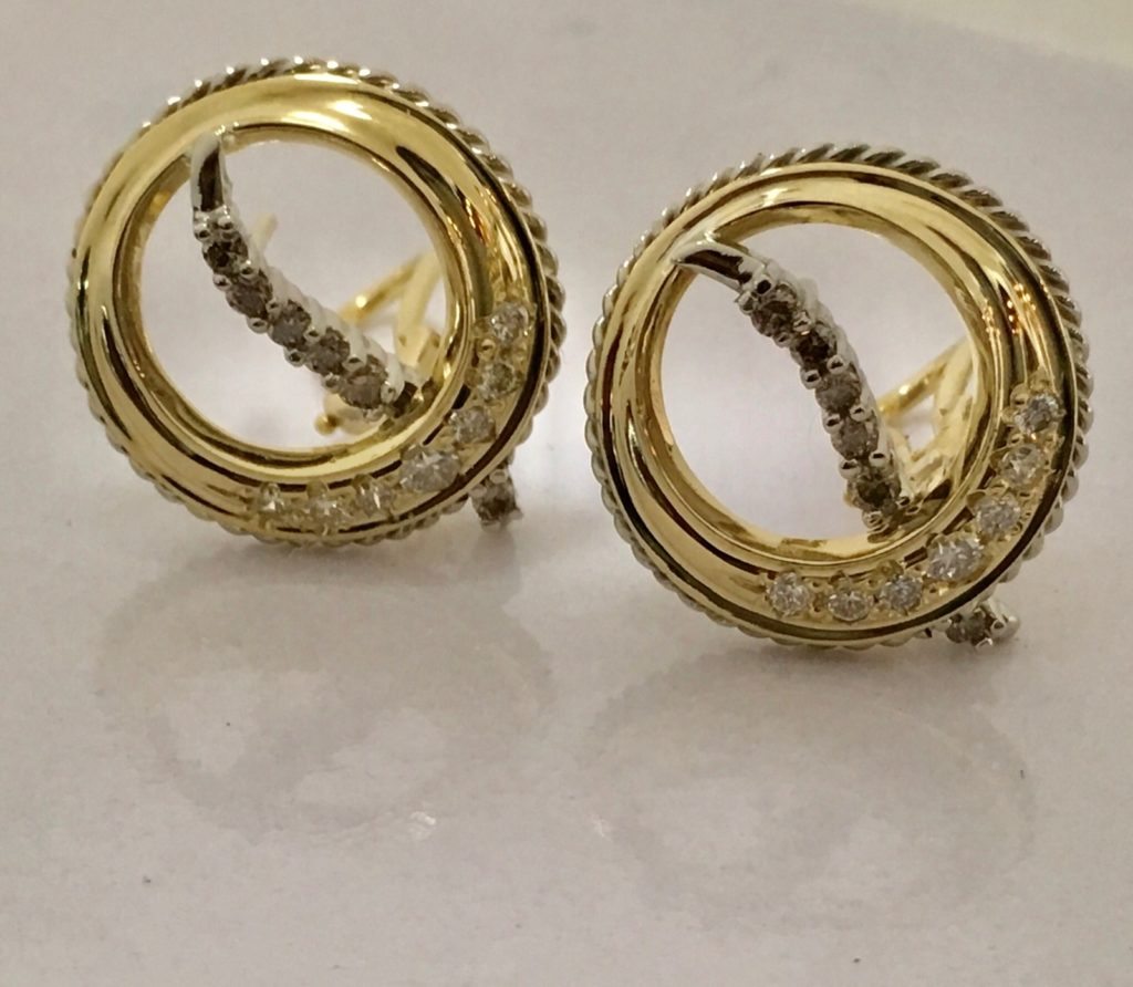 Texture And Movement Evolve From The Ripple Contour Of These Circular And Simple But Elegant 18KT Two Tone Dual Color Diamond Omega Backed Earrings