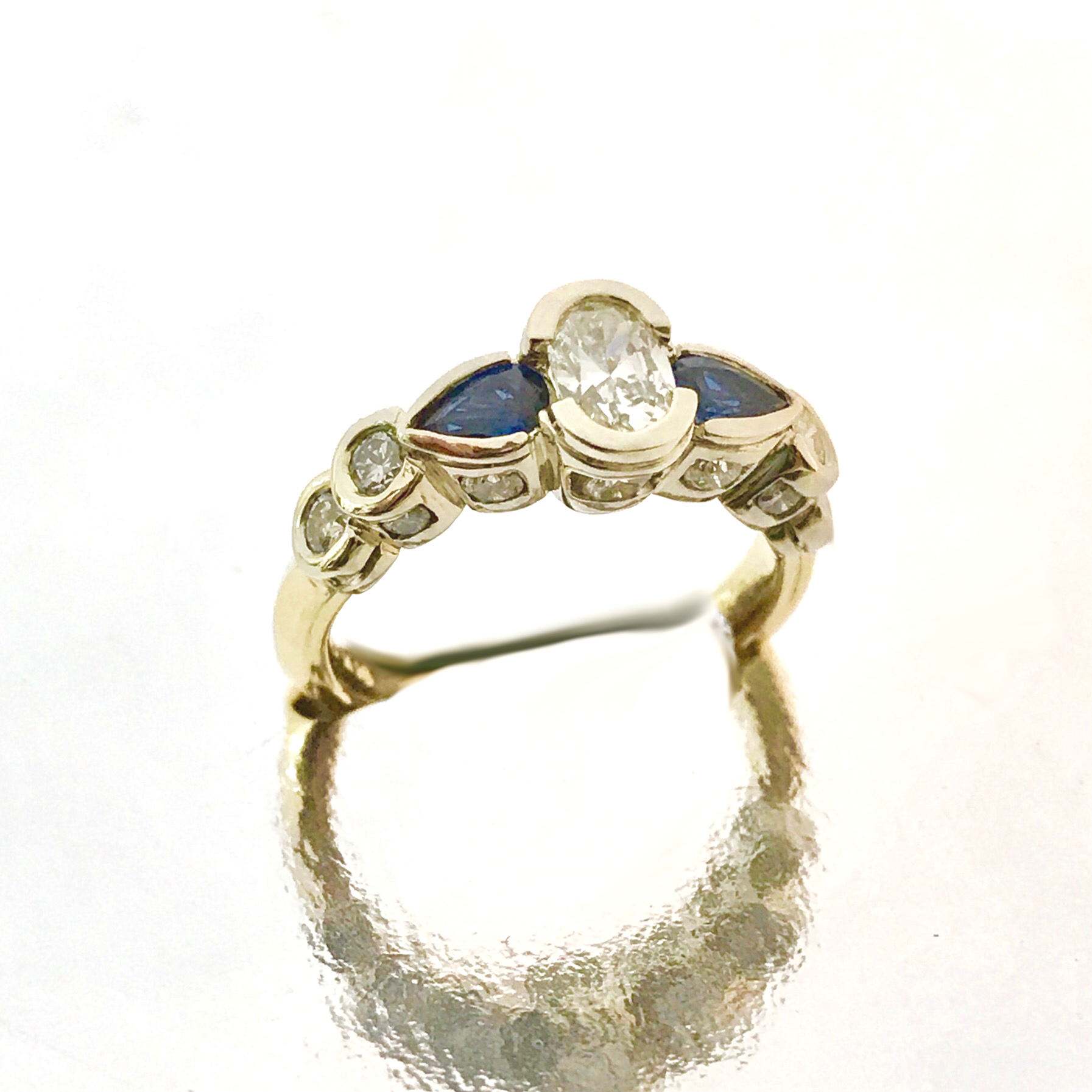 Custom 14 Kt Two Tone Sapphire and Diamond Ring With Diamonds On All Faces Of The Ring