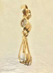 14 Kt Yellow Gold Custom Designed Genuine Pearl Found Directly From An Oyster and Featured With A Bezel Set Marquise Cut Diamond To Make A Stunning Pendant