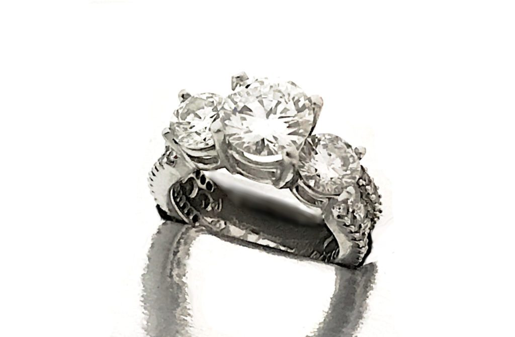 Custom Platinum and Diamond Three Stone Engagement Style Ring