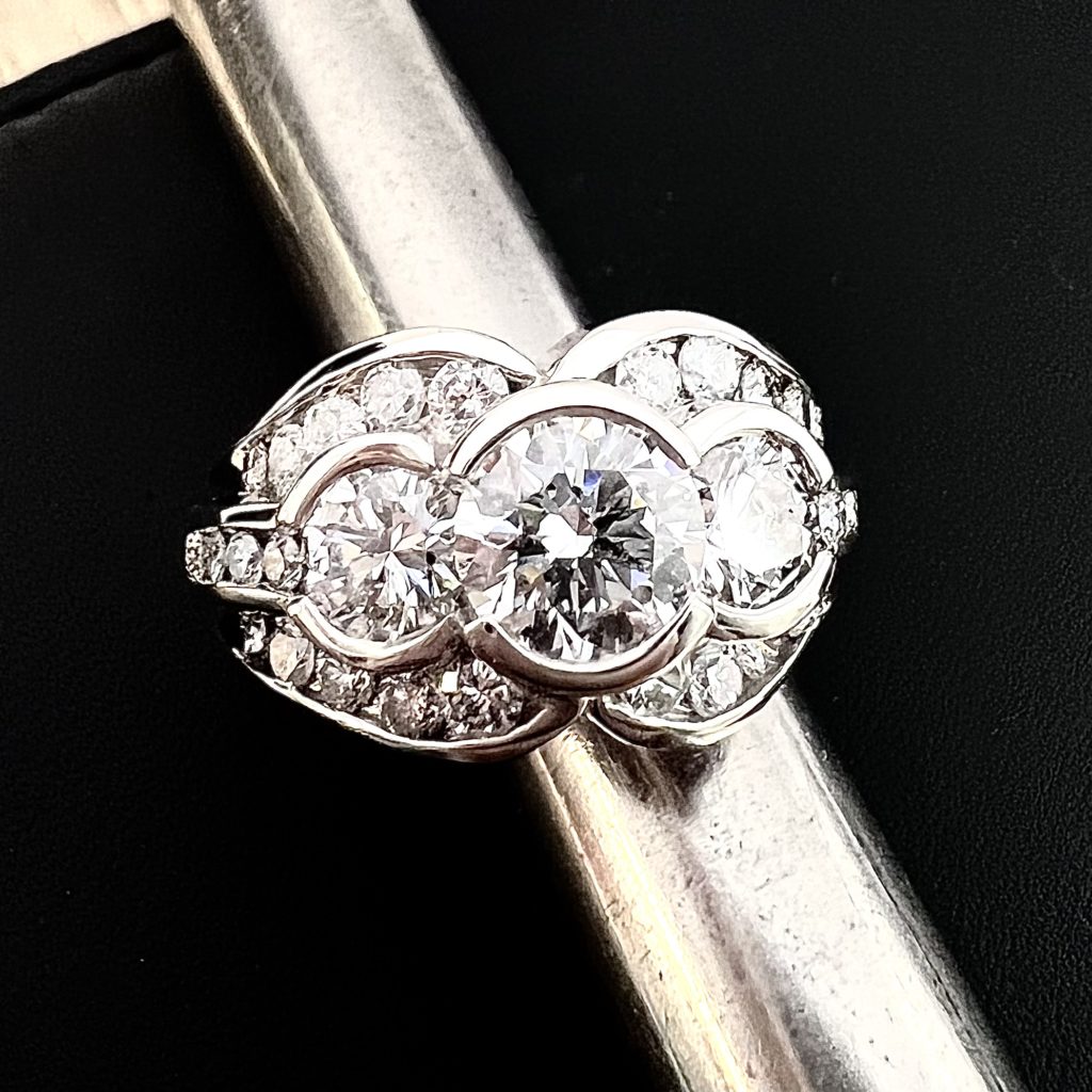 Custom designed three stone diamond ring